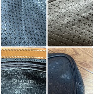 May include: Black leather handbag with embossed logo pattern. The bag features a zipper closure and a tan leather trim. The interior is black leather with the brand name "Courr&egrave;ges Paris made in France" printed on it.