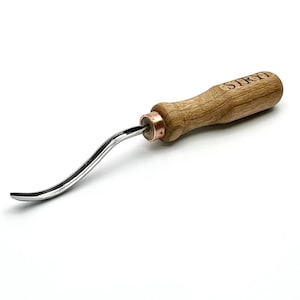 May include: A wood carving tool with a curved, polished metal blade and a wooden handle. The handle is engraved with the word "SIRY". The tool has a copper ferrule where the blade meets the handle.