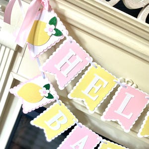 May include: A rustic wooden sign with the text "Welcome to our home" in a handwritten style. The sign features a distressed finish and a simple, inviting design, perfect for a front porch or entryway.
