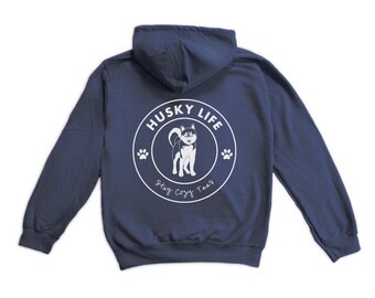 May include: Navy blue hooded sweatshirt with a white circle graphic on the back. The graphic features a husky dog, the words "Husky Life", and the text "Stay Cozy, Treat Yourself".