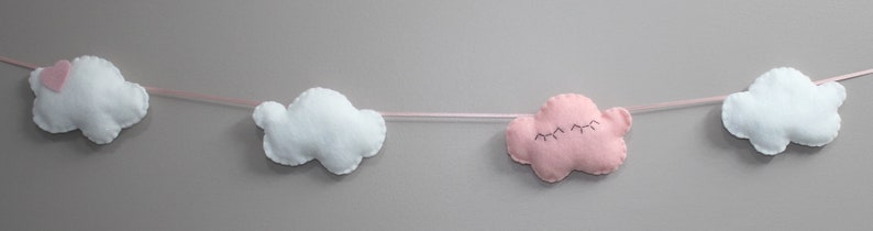 Cutest felt cloud garland for kids'/baby room: white, sparkly clouds and a sleepy pink cloud with eyelashes image 4