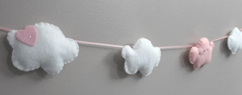 Cutest felt cloud garland for kids'/baby room: white, sparkly clouds and a sleepy pink cloud with eyelashes image 5