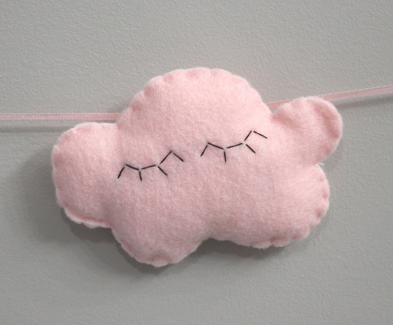 Cutest felt cloud garland for kids'/baby room: white, sparkly clouds and a sleepy pink cloud with eyelashes image 8