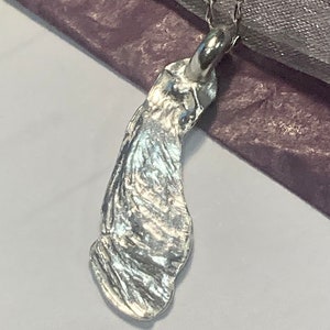 Solid fine silver sycamore seed pendant on a sterling silver chain