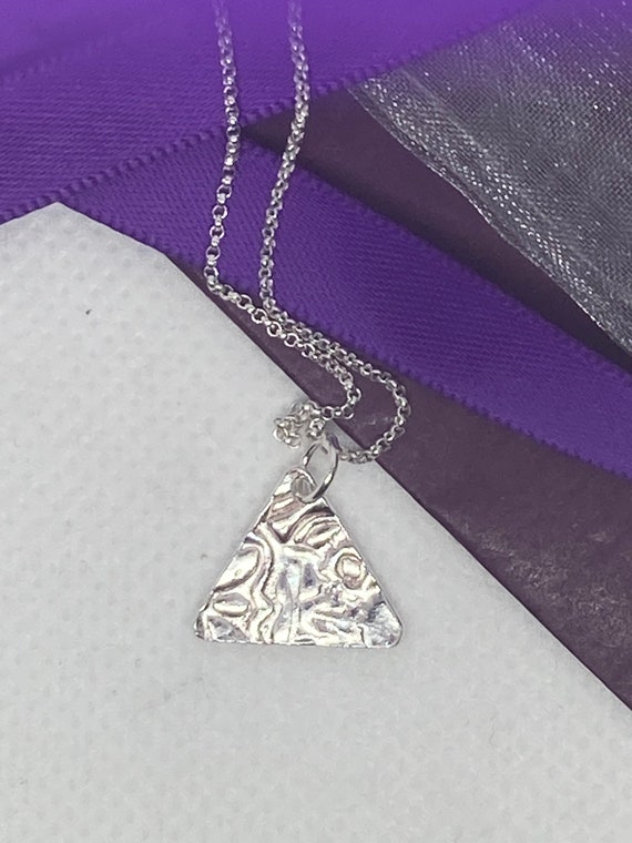Silver xxx pendant and fine silver chain delivery included