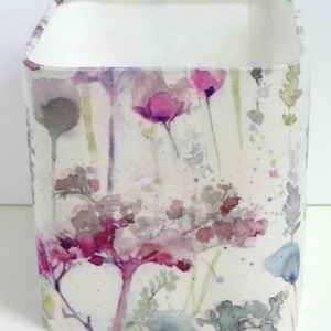 May include: Square lampshade with a watercolour floral print featuring pink, purple, and green flowers on a white background.