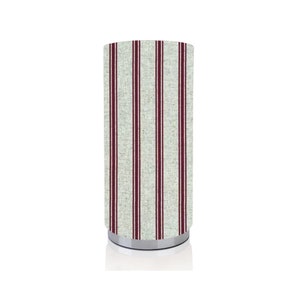 May include: A cylindrical lamp base with a white fabric shade featuring vertical red stripes. The base is made of metal and has a silver finish.