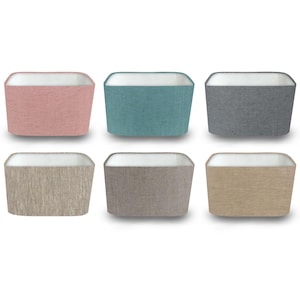 May include: Six rectangular fabric storage bins in various colours: pink, teal, grey, tan, taupe, and beige. Each bin has a white interior and a textured exterior, ideal for organising items.