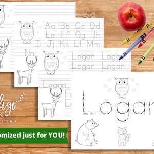 May include: Printable worksheet for kids to practice writing the name Logan. The worksheet features a dotted outline of the name, a deer, an owl, and a bear. The worksheet also includes a section for practicing the alphabet.