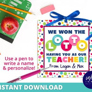 May include: A colorful printable teacher appreciation card with the text "We won the LOTTO having you as our TEACHER!" and a space to write a name. The card has a polka dot background and a blue ribbon.