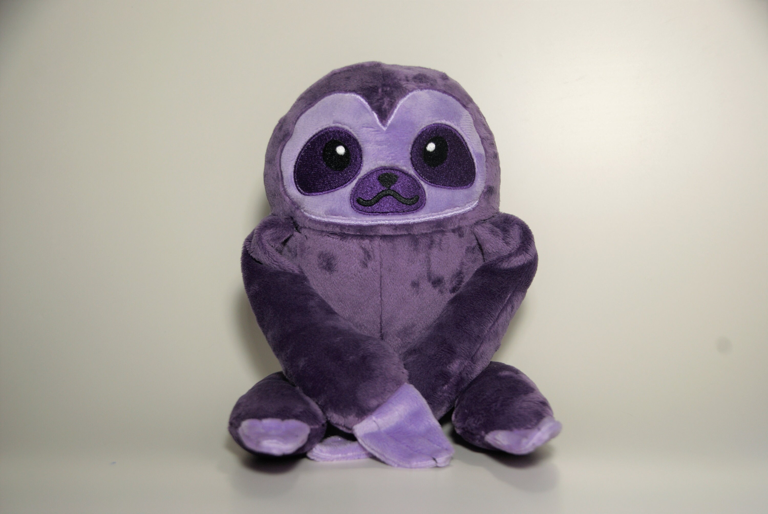 purple sloth plush
