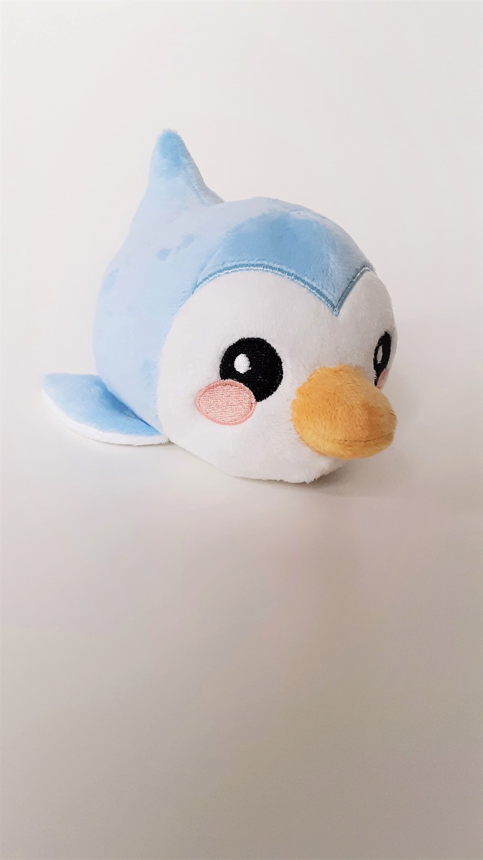 blue stuffed penguin