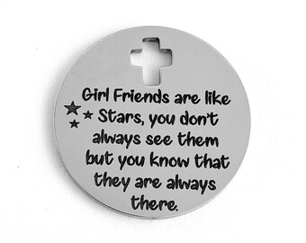 May include: A silver round charm with a cross cut-out and the text "Girl Friends are like ** Stars, you don't always see them but you know that they are always there."