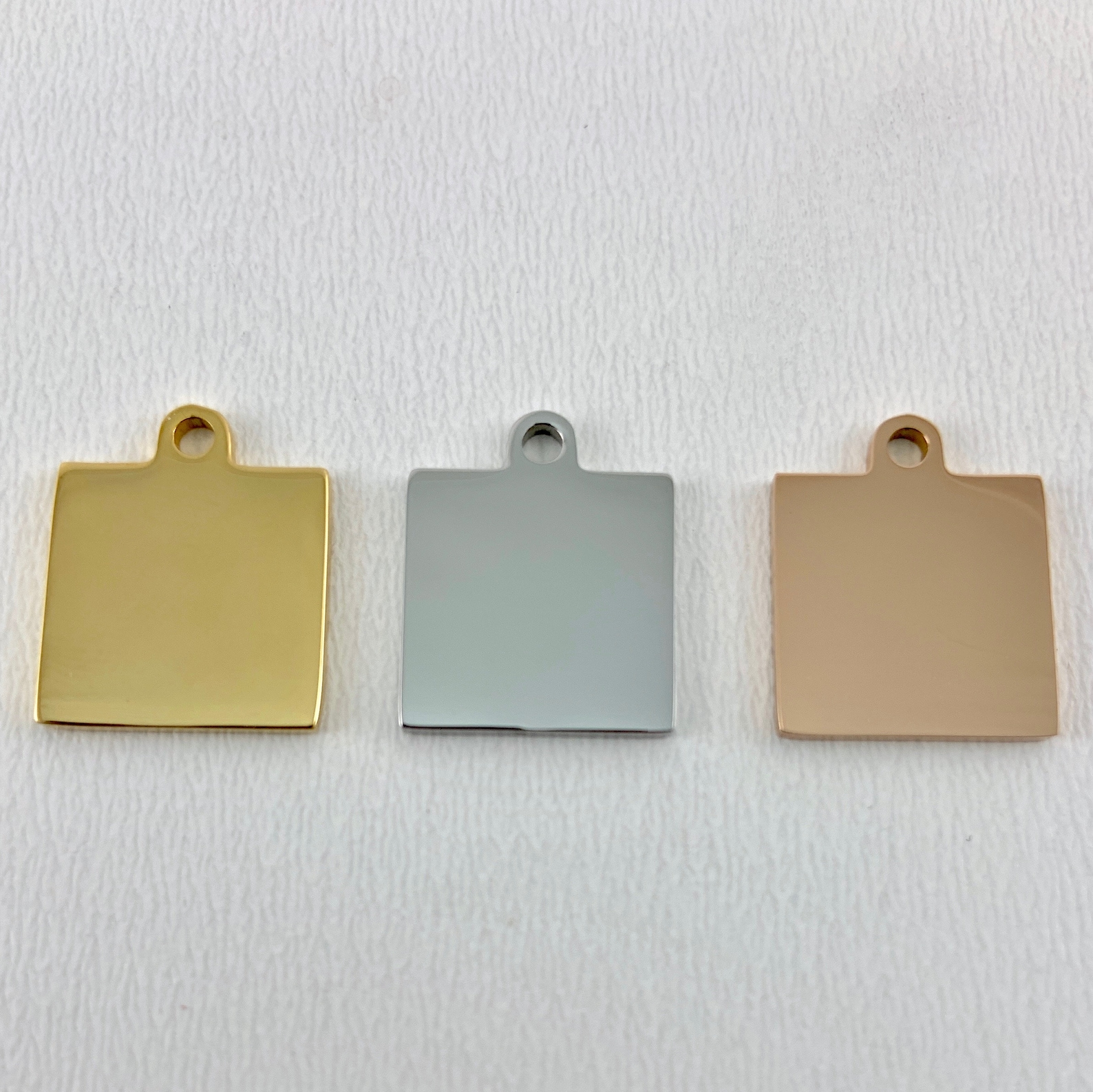 Stainless steel pendant engraved with &lsquo;Invest in Your HAIR It&rsquo;s the Crown You Never Take off&rsquo;