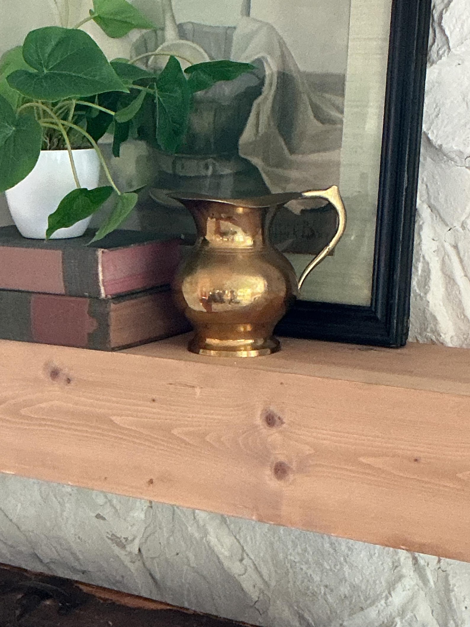 Vintage brass pitcher vase for a cowgirl coastal kitchen