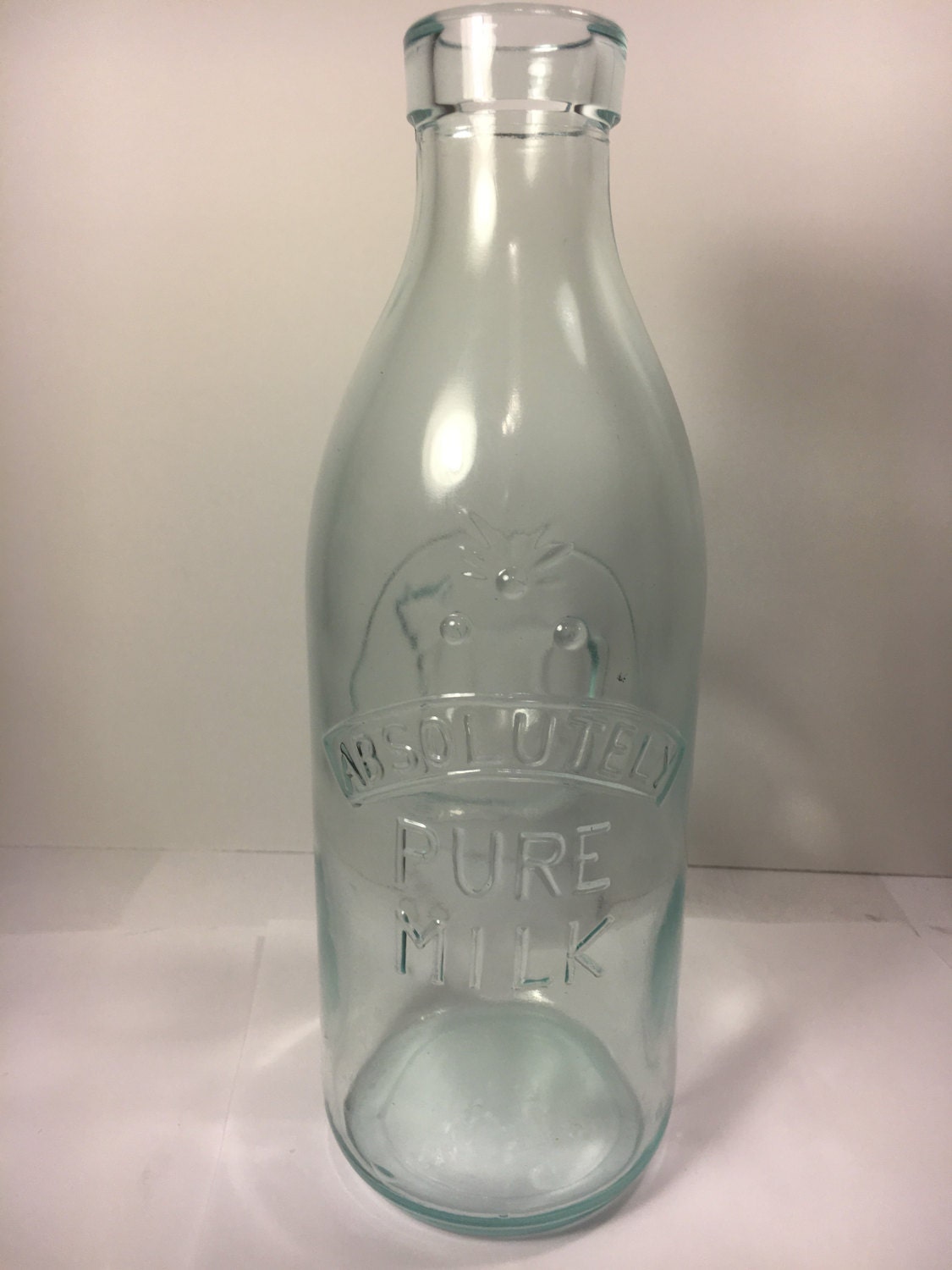 Vintage Absolutely Pure Milk Clear Embossed Cow Milk Bottle Green Tint