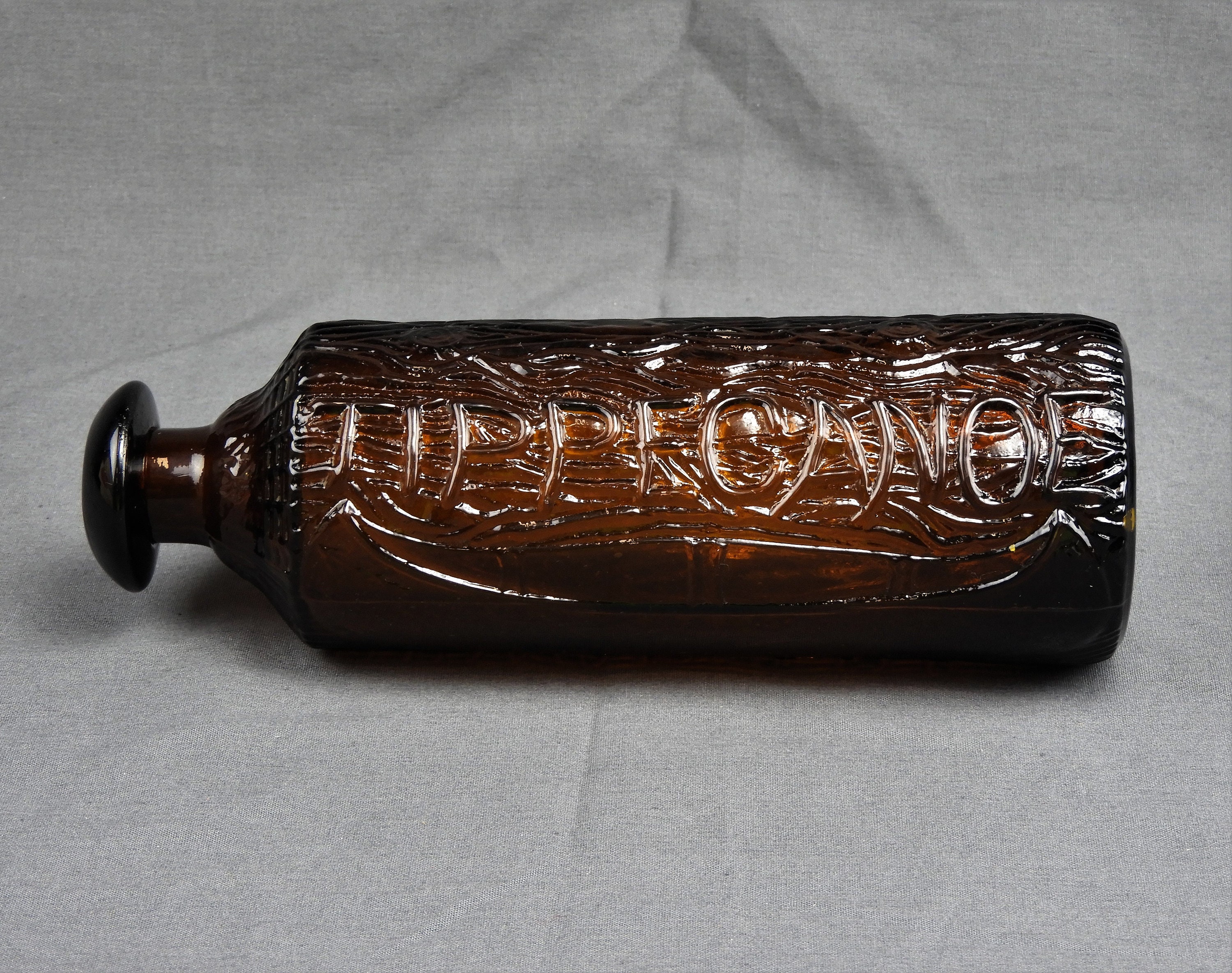 Antique Bitters Bottle, 1883 Tippecanoe, Birch Log & Canoe Relief