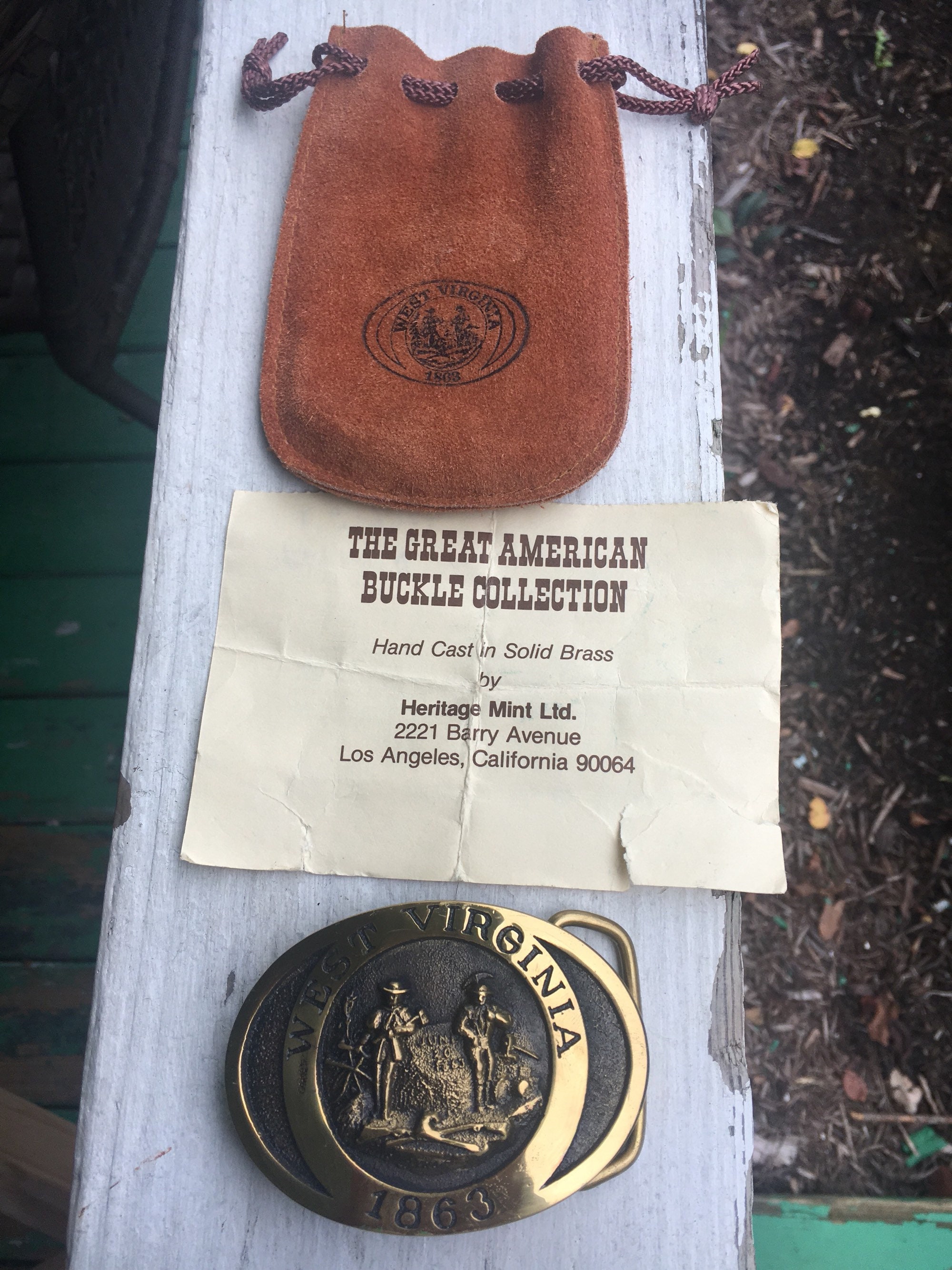 heritage mint ltd belt buckles