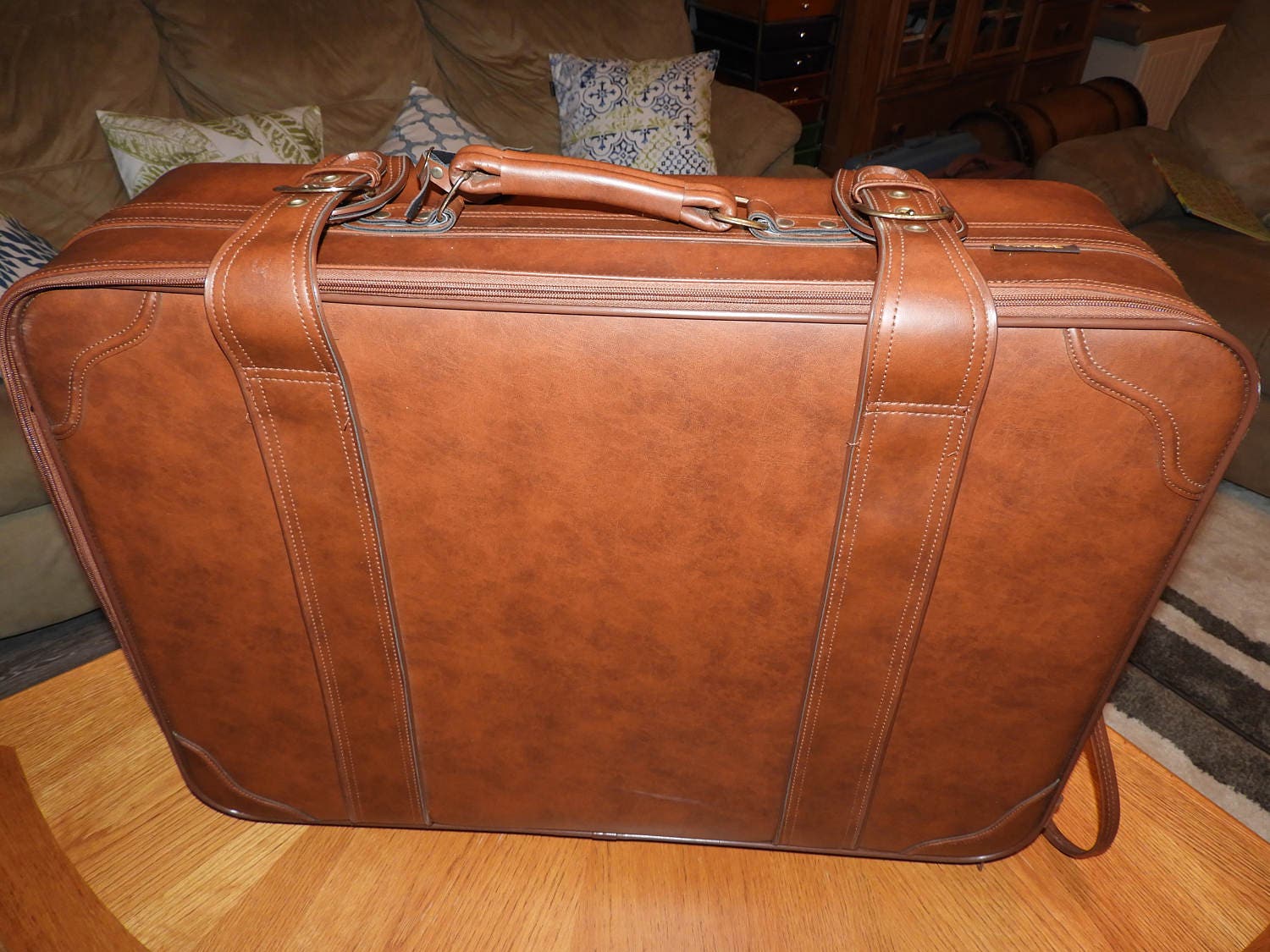 leather luggage with wheels