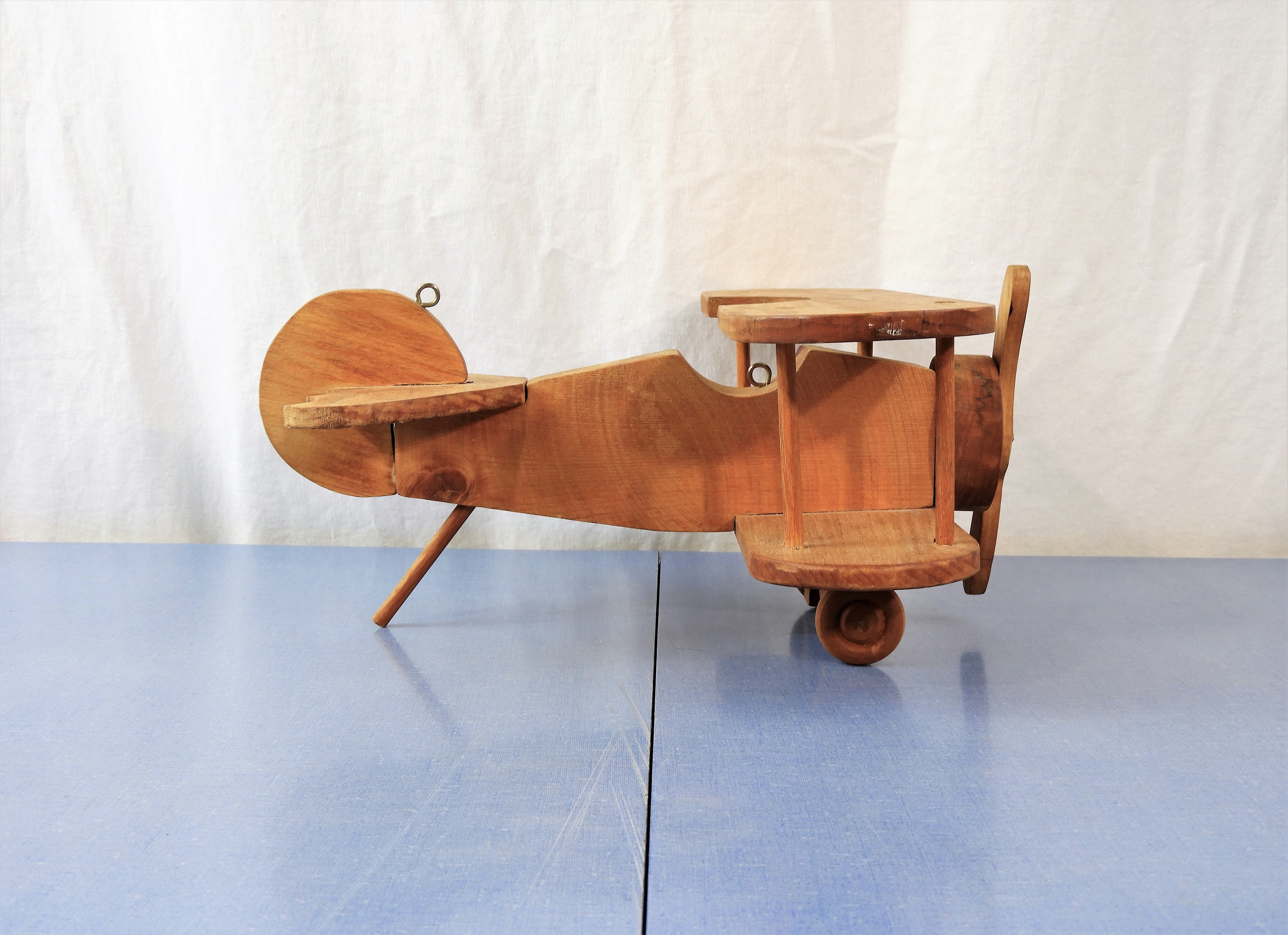 toy plane hanging from ceiling