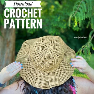 May include: Digital download crochet pattern for a brown crochet sun hat. The hat is being worn by a person with long brown hair.