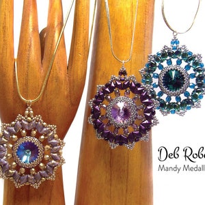 May include: Three beaded necklaces with star-shaped pendants. The pendants are made with purple, blue, and green beads and feature a crystal in the centre. The necklaces are displayed on a wooden hand.