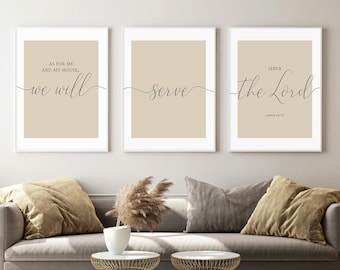 May include: A set of three rectangular wall art prints with white frames, featuring a beige background and black cursive text. The prints display the phrase: As for me and my house, we will serve the Lord, with the scripture reference Joshua 24:15.