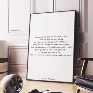May include: A rectangular wall art print featuring black typewriter-style text on a white background. The quote reads: We can make the best or the worst of it. I hope you make the best of it. F. Scott Fitzgerald. The text is centered on the page.