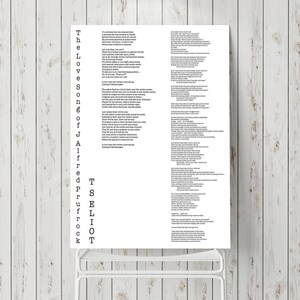 May include: A black and white print of a poem titled "The Love Songs of J. Alfred Prufrock" by T.S. Eliot. The poem is printed on a white background and is framed in a black frame.