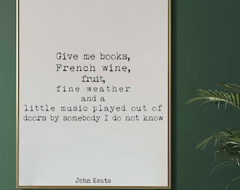 May include: A framed print with a white background and black text. The text reads: "Give me books, French wine, fruit, fine weather and a little music played out of doors by somebody I do not know." The text is attributed to John Keats.