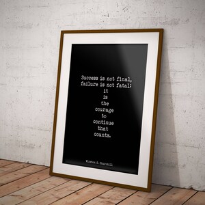 May include: Black and white framed motivational quote by Winston S. Churchill. The quote reads: "Success is not final, failure is not fatal: it is the courage to continue that counts."