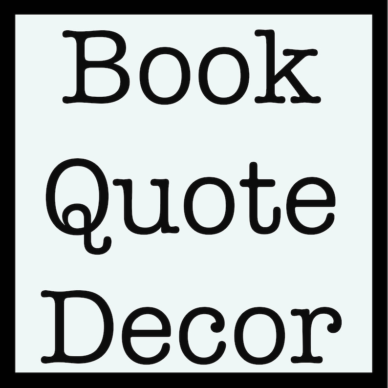 May include: Black and white text on a light blue background. The text reads "Book Quote Decor".