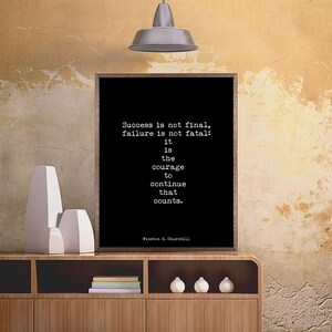 May include: Black and white typography print with a motivational quote by Winston S. Churchill. The quote reads: "Success is not final, failure is not fatal: it is the courage to continue that counts."
