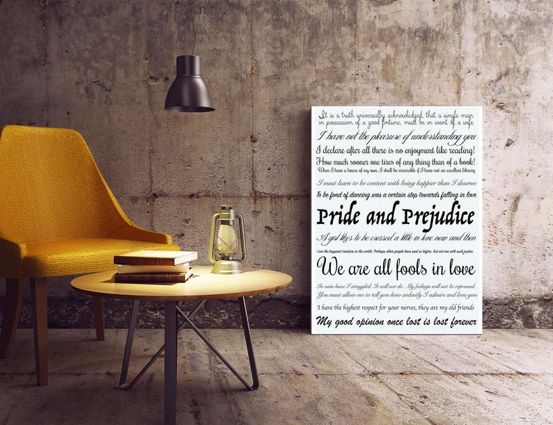 May include: A black and white print with an excerpt from Jane Austen's novel "Pride and Prejudice". The text reads "It is a truth universally acknowledged, that a single man in possession of a good fortune, must be in want of a wife." The text continues with other famous quotes from the novel. The print is displayed on a wall in a room with a yellow armchair, a side table, and a lantern.