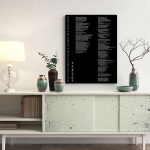 May include: A white lamp with a white shade sits on a white and green cabinet with a black and white poster that reads "The Love Song of J. Alfred Prufrock" by T.S. Eliot. There are three vases on the cabinet, one green, one brown, and one white.