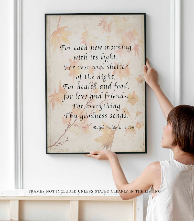 May include: A framed print with a quote by Ralph Waldo Emerson. The quote reads: "For each new morning with its light, For rest and shelter of the night, For health and food, for love and friends, For everything Thy goodness sends."