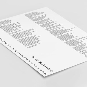 May include: A black and white print of the lyrics to the song "Love Song of J. Alfred Prufrock" by T.S. Eliot. The lyrics are printed in a typewriter font.