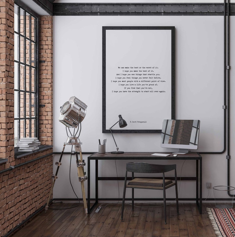 May include: A framed vertical wall art print featuring black typewriter-style text on a white background. The quote reads: We can make the best or the worst of it. I hope you make the best of it. And I hope you see things that startle you.