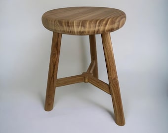 Wooden solid teak stool at chair height