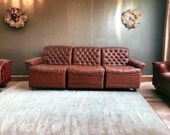 Vintage elements armchair / settee / sofa in cognac color