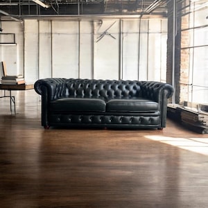 Sturdy black leather chesterfield seat / sofa / couch