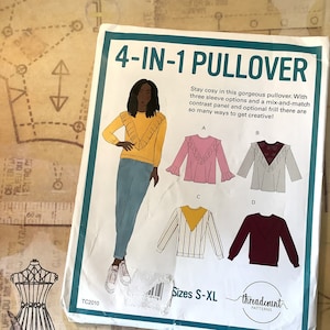 May include: A sewing pattern for a 4-in-1 pullover with three sleeve options and a mix-and-match contrast panel. The pattern includes sizes S-XL and is from Threadcount Patterns.