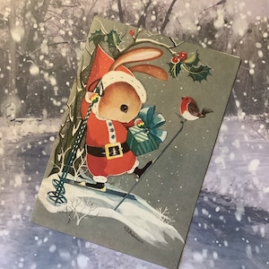 ESTREMAMENTE RARA cartolina di Natale vuota retrò/vintage degli anni '70 ADORABILE disegno di coniglio sugli sci di Heather S Buchanan - cartolina da incorniciare - Nostalgia
