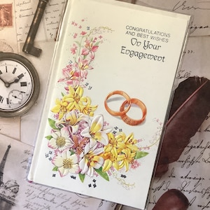RARE Vintage 1970s 'Congratulazioni e auguri per il tuo biglietto di fidanzamento - Fedi nuziali e design floreale con una scintilla - Biglietto per amanti retrò