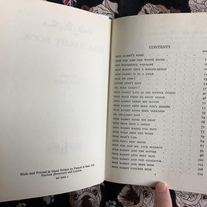 May include: Open book with pages displaying the contents of "Brer Rabbit Book". The table of contents lists stories like "Brer Rabbit's Pond" and "Brer Fox and the White Plums". The book is printed in Great Britain.