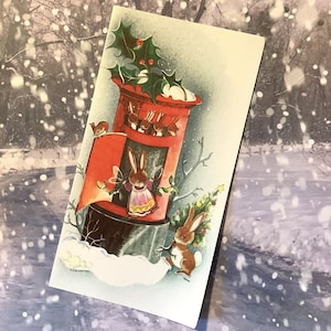 ESTREMAMENTE RARA cartolina di Natale vuota retrò/vintage degli anni '70, stravagante famiglia di conigli in una cassetta delle lettere, design di Heather S Buchanan - Nostalgia