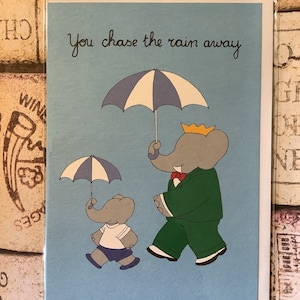 Babar de olifant Superschattige blanco kaart 'Je jaagt de regen weg' - ongebruikelijke kaart - leuk, kaart om in te lijsten - Babar The Elephant Lover-kaart