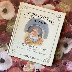 May include: A vintage children's book titled "Lucy runs out of wool" by Rae Knight with illustrations by Honor Redstone. The cover features a piglet sitting in a basket with other piglets around it.