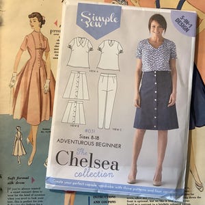 May include: A Simple Sew sewing pattern envelope for The Chelsea collection, featuring a 5-in-1 design for sizes 8-18. The cover displays technical line drawings of a blouse, skirt, and trousers, alongside a photograph of a model wearing the outfit.