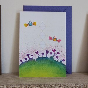 Carte de voeux: coeurs avec butterflybirds